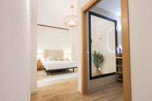 Ένα ή περισσότερα κρεβάτια σε δωμάτιο στο Hostal Roca 26