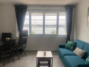 Istumisnurk majutusasutuses Splendide Studio Miramar vue mer avec terrasse