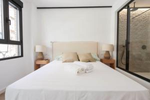 Ένα ή περισσότερα κρεβάτια σε δωμάτιο στο Hostal Roca 26 +10 φωτογραφίες