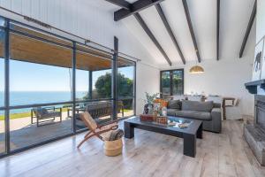 A seating area at Rbk° Casa en Concón remodelada vista increíble