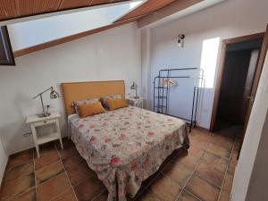 Postel nebo postele na pokoji v ubytování Corteganillas + 16 fotografií