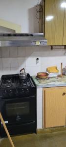 Køkken eller tekøkken på Departamento RyJ + 5 billeder