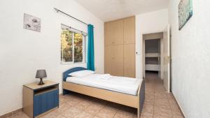 A bed or beds in a room at Villa Dirui