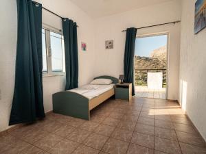 A bed or beds in a room at Villa Dirui