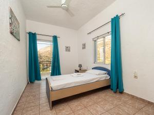 A bed or beds in a room at Villa Dirui