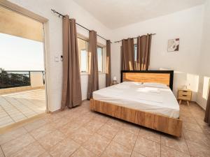 A bed or beds in a room at Villa Dirui