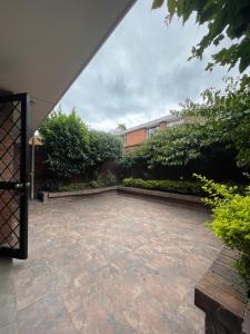 Jardín al aire libre en Bamuka Hostal