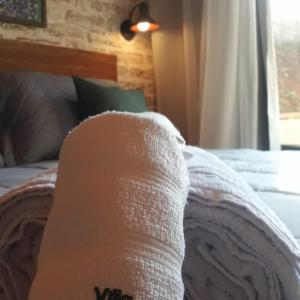 Postel nebo postele na pokoji v ubytování Villa Pinhas e Flores
