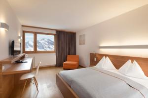 TV a/nebo společenská místnost v ubytování Hotel Manggei Designhotel Obertauern