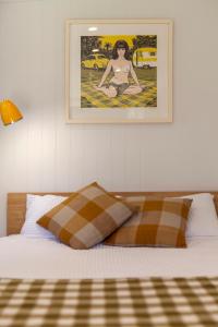 Postel nebo postele na pokoji v ubytování Otaki Beach Guesthouse