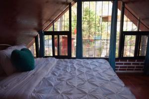 Giường trong phòng chung tại Cabaña monte de los olivos