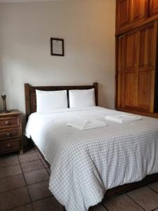 Postel nebo postele na pokoji v ubytování Posada Sancris