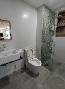 Koupelna v ubytování JazzSuites Vivacity Kuching Home