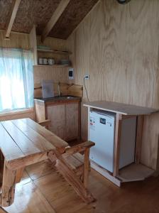 Kuchyň nebo kuchyňský kout v ubytování Cabaña Rancho JyC
