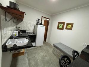 Η κουζίνα ή μικρή κουζίνα στο Casas Pipa Brasil