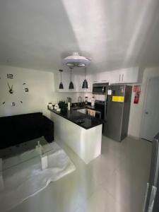 Η κουζίνα ή μικρή κουζίνα στο Luxury Apartment Hot Water,AC,WiFi,PS3