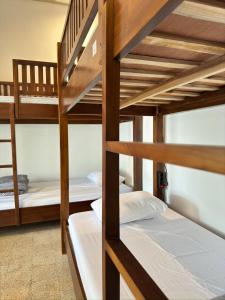 Postel nebo postele na pokoji v ubytování Ijen Haus + 37 fotografií