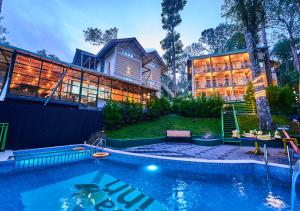 Bazén v ubytování Areva Inn Plantation Resort Munnar with Pool by VOYE HOMES nebo v jeho okolí