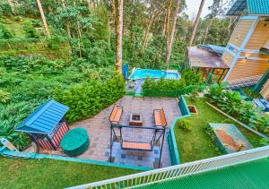 Zahrada ubytování Areva Inn Plantation Resort Munnar with Pool by VOYE HOMES