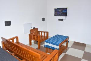 TV a/nebo společenská místnost v ubytování Danshika Temple Residency