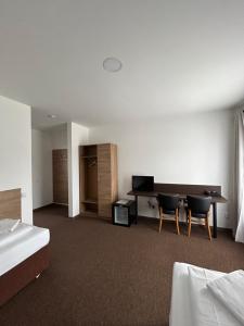 Postel nebo postele na pokoji v ubytování Motel R10