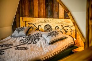 Ένα ή περισσότερα κρεβάτια σε δωμάτιο στο MICHASIÓWKA