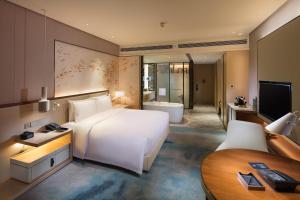 TV o dispositivi per l'intrattenimento presso Hilton Quanzhou Riverside