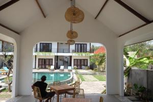 Bazén v ubytování Dipenida Bali nebo v jeho okolí