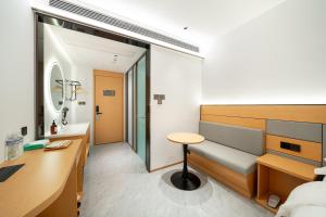 Posezení v ubytování Denpa Inn - Shanghai Hongqiao Jinhui Road Branch + 37 fotografií