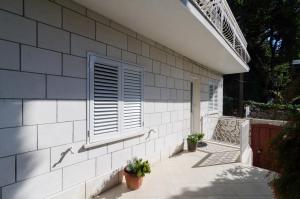 Ein Garten an der Unterkunft Guesthouse Matusic