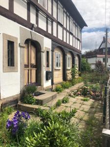a house with a garden in front of it at Mandauhaus Großschönau in Großschönau