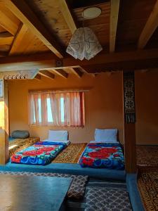 Postel nebo postele na pokoji v ubytování Passu Cones Hotel