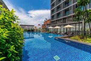 Bazén v ubytování PLAAI Prime Hotel Rayong SHA Extra Plus nebo v jeho okolí