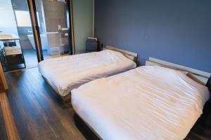 Letto o letti in una camera di 由良民泊島宿