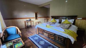 Postel nebo postele na pokoji v ubytování Hotel Gangchen Tabo