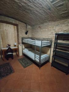Letto o letti in una camera di Alba Hostel