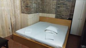 Letto o letti in una camera di Alba Hostel