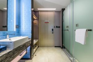 Φωτογραφία από το άλμπουμ του Echarm Hotel Chongzuo Youyi Avenue South High Speed Railway Station σε Hongjiang