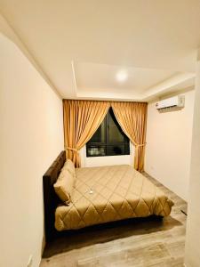 a small bedroom with a bed with a window at 24'HR CHECK IN H'FLOOR SARADISE MERRITON RESIDENCY KUCHING LUXURY BALCONY FACING AIRPORT 3R2B-2Cpark in Kuching +18 photos