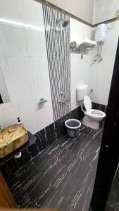 Kupatilo u objektu Agralam Cottages @Raghunandan Resort +6 fotografija