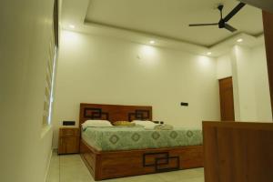 Postel nebo postele na pokoji v ubytování Highrange villas