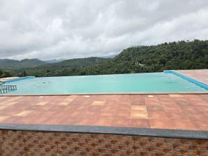 Bazén v ubytování Highrange villas nebo v jeho okolí