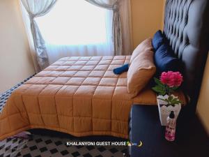 Ένα ή περισσότερα κρεβάτια σε δωμάτιο στο Khalanyoni Guest House +18 φωτογραφίες
