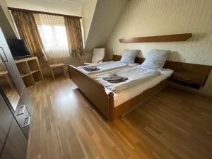 Postel nebo postele na pokoji v ubytování Beny Hotel Restaurant