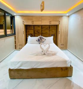 Postel nebo postele na pokoji v ubytování Appartment bades alhoceima