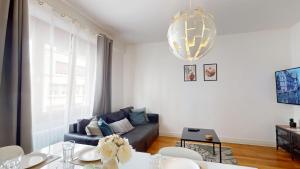 Posezení v ubytování La Symphonie de l'Orangerie