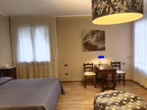 Postel nebo postele na pokoji v ubytování B&B Paolo e Francesca