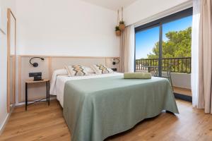 Postel nebo postele na pokoji v ubytování Copaiba by Honne Hotels - Adults Only