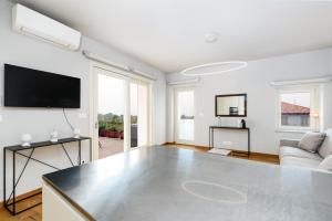 TV o dispositivi per l'intrattenimento presso Week Mor