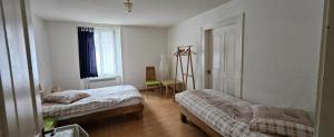 Postel nebo postele na pokoji v ubytování Ferienwohnung Haus Ryter